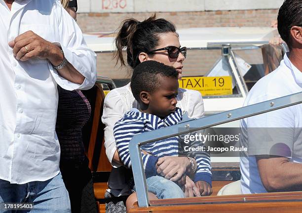 Actress Sandra Bullock and son Louis Bardo Bullock are seen during the 70th Venice International Film Festival on August 27, 2013 in Venice, Italy.