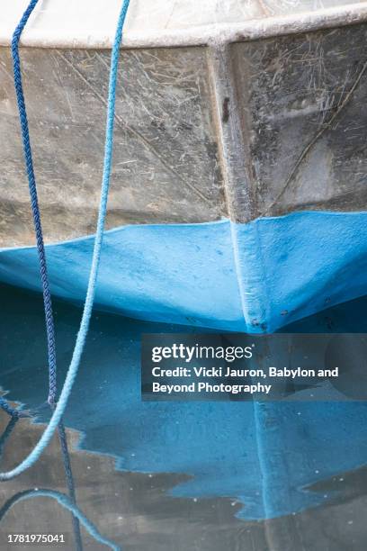 artistic composition of boat and ropes with reflection in water in isle of skye, scotland - beyond stock pictures, royalty-free photos & images