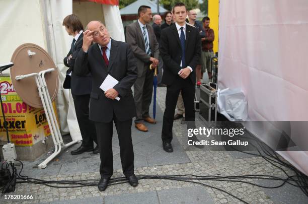 Gregor Gysi, Chairman of the Bundestag faction of the German left-wing party Die Linke, stands behind stage before speaking to supporters during an...