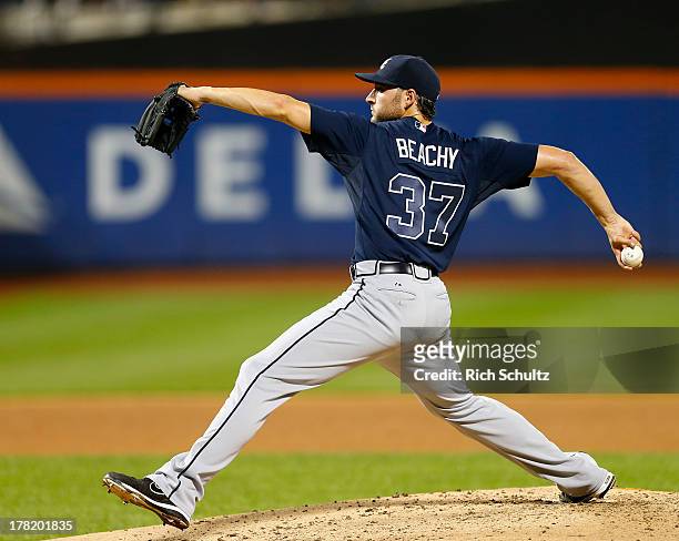 Pitcher Brandon Beachy of the Atlanta Braves delivers a pitch against the New York Mets during a game on August 20, 2013 at Citi Field in the...