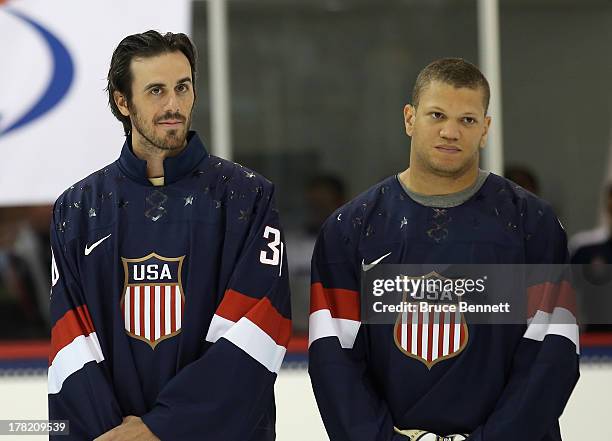 Ryan Miller and Kyle Okposo take part in a press conference introducing the 2014 USA Hockey Olympic Team candidates at the Kettler Capitals Iceplex...