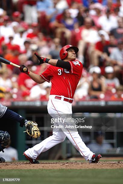 Cesar Izturis of the Cincinnati Reds bats during the game against the San Diego Padres on Sunday, August 11, 2013 at Great American Ball Park in...