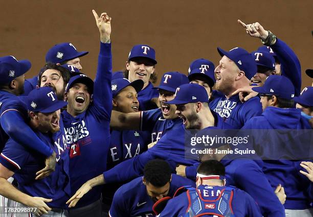 The Texas Rangers celebrate after beating the Arizona Diamondbacks 5-0 in Game Five to win the World Series at Chase Field on November 01, 2023 in...