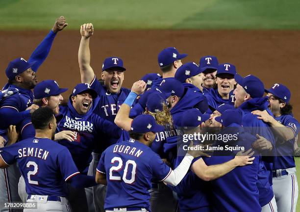 The Texas Rangers celebrate after beating the Arizona Diamondbacks 5-0 in Game Five to win the World Series at Chase Field on November 01, 2023 in...