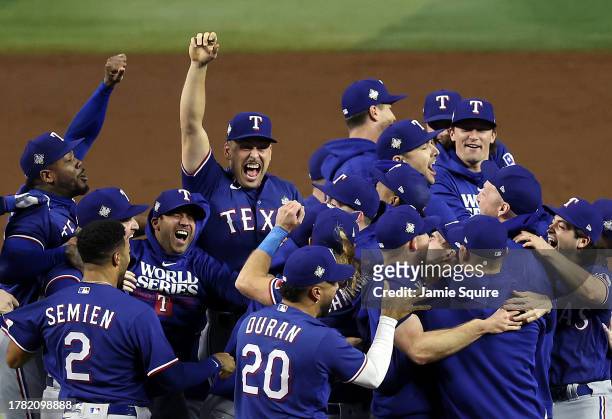 The Texas Rangers celebrate after beating the Arizona Diamondbacks 5-0 in Game Five to win the World Series at Chase Field on November 01, 2023 in...