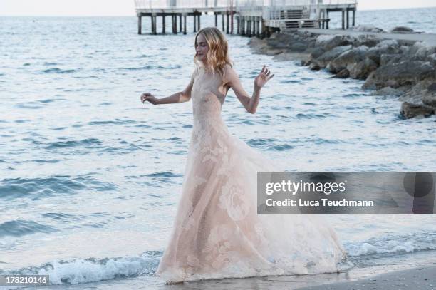 Festival hostess Eva Riccobono attends a photocall during the 70th Venice International Film Festival at the Hotel Excelsior on August 27, 2013 in...