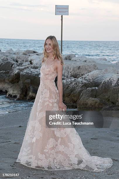 Festival hostess Eva Riccobono attends a photocall during the 70th Venice International Film Festival at the Hotel Excelsior on August 27, 2013 in...