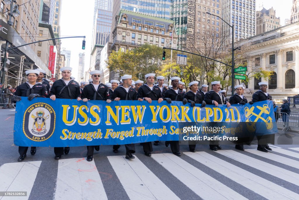 Crew members of USS New York (LPD-21) march during 104th...