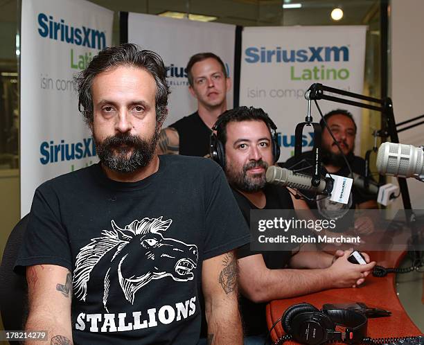 Tito Fuentes, Mickey Huidobro, Paco Ayala and Randy Ebright of Latin rock band Molotov visit the SiriusXM studios to promote the Jagermeister Music...
