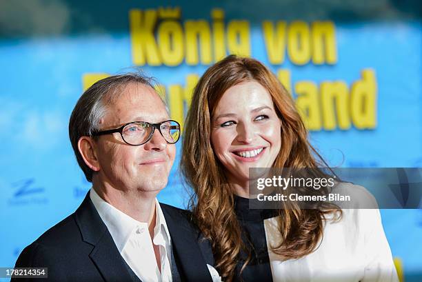 Olli Dittrich and Katrin Bauerfeind attend the 'Koenig von Deutschland' Berlin premiere at Kino International on August 27, 2013 in Berlin, Germany.