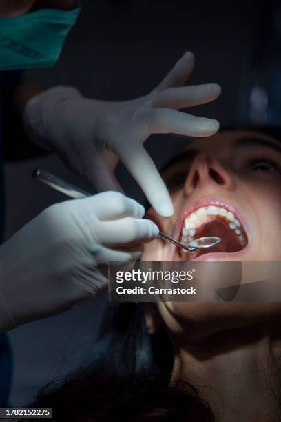 patient at the dentist prepared for intervention - dentist stock pictures, royalty-free photos & images