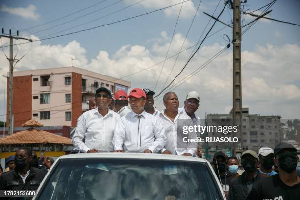 Members of the collective of opposition candidates, including former Presidents of Madagascar, Hery Rajaonarimampianina, Marc Ravalomanana and Roland...