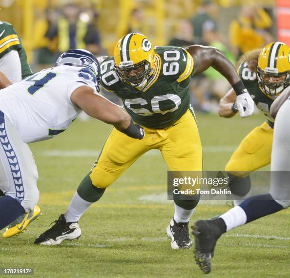Packer Block Center Patrick Lewis of the Green Bay Packers blocks during the NFL ...