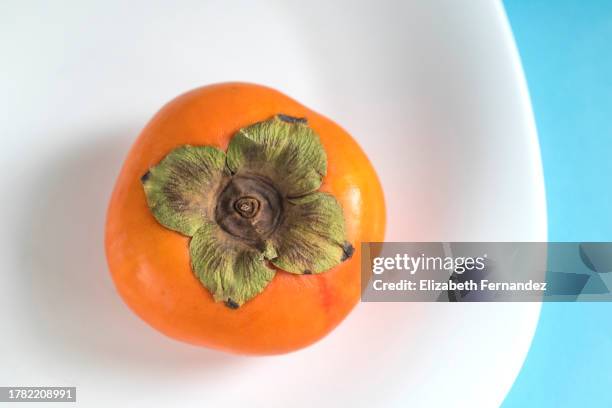 sweet ripe persimmon - caqui fruta tropical - fotografias e filmes do acervo