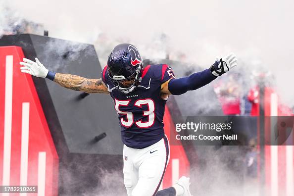 Blake Cashman of the Houston Texans runs out of the tunnel prior to