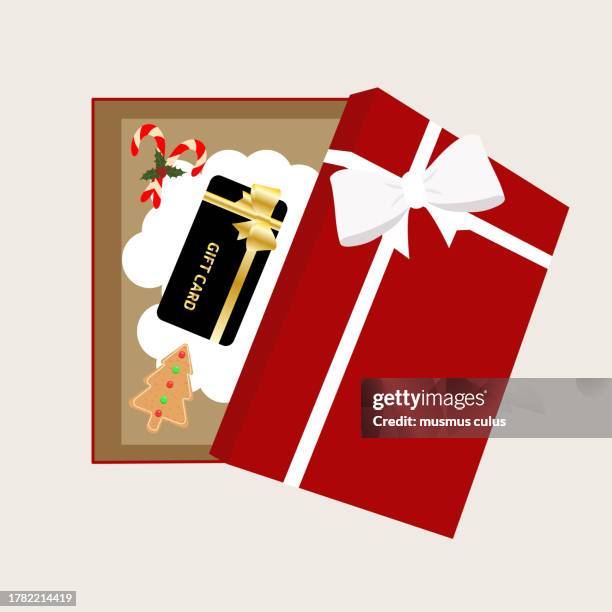stockillustraties, clipart, cartoons en iconen met candy bars, christmas cookies and a gift certificate are prepared to be given as a gift in a gift box. top view of box - goodie bag