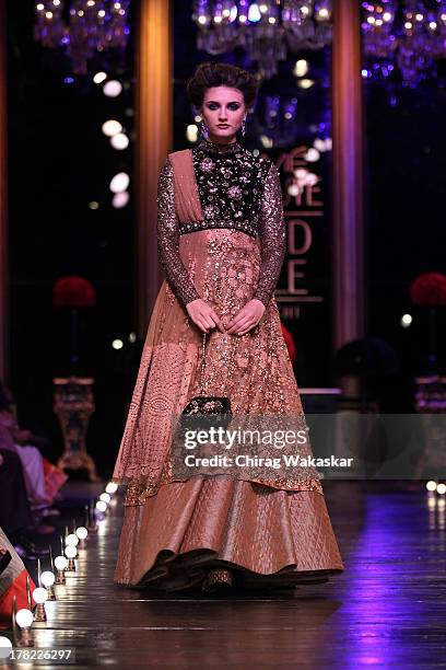 Model showcases designs by Sabyasachi Mukherjee during Grand Finale on day 5 of Lakme Fashion Week Winter/Festive 2013 at the Hotel Grand Hyatt on...