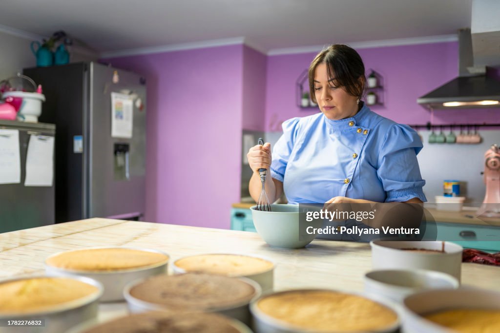 Woman mixing cake batter