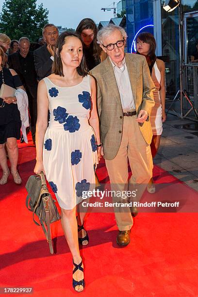 Director Woody Allen and his wife Soon-Yi Previn arrive to the Paris premiere of "Blue Jasmine" at UGC Cine Cite Bercy on August 27, 2013 in Paris,...