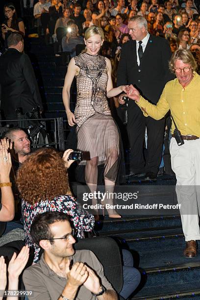 Actress Cate Blanchett enters the theater during the Paris premiere of "Blue Jasmine" at UGC Cine Cite Bercy on August 27, 2013 in Paris, France.