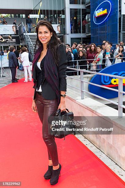 Actress Catalina Denis arrives to the Paris premiere of "Blue Jasmine" at UGC Cine Cite Bercy on August 27, 2013 in Paris, France.