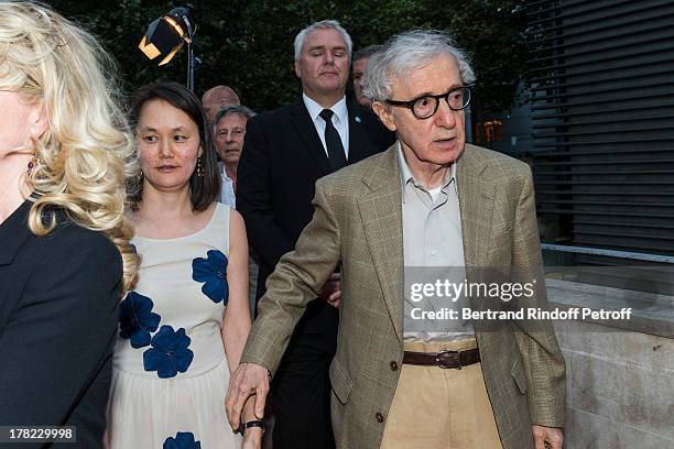 Director Woody Allen and his wife Soon-Yi Previn arrive to the Paris premiere of "Blue Jasmine" at UGC Cine Cite Bercy on August 27, 2013 in Paris,...