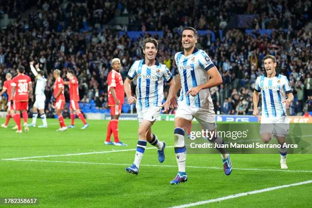 Mikel Merino of Real Sociedad celebrates after scoring the team's first goal during the UEFA Champions League match between Real Sociedad and SL...