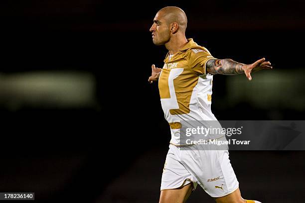 Ariel Nahuelpan of Pumas celebrates a goal against Atletico San Luis during a match between Pumas and Atletico San Luis as part of the Apertura 2013...
