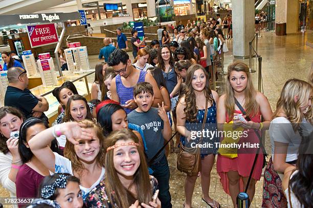 Fans line up to attend an exclusive meet & greet with YouTube Celebrity Bethany 'Macbarbie07' Mota at the Woodfield mall Aeropostale on August 27,...