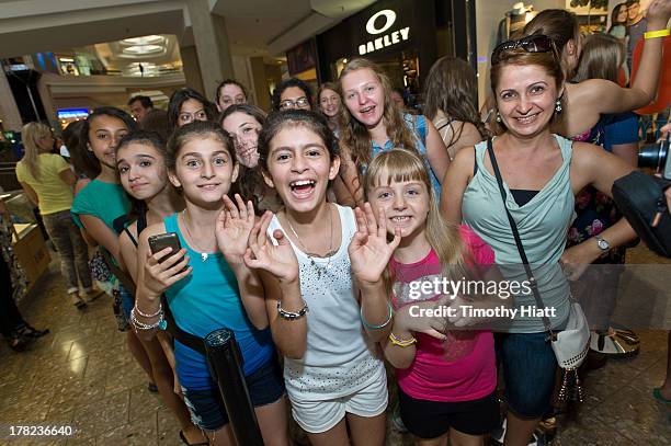 Fans line up to attend an exclusive meet & greet with YouTube Celebrity Bethany 'Macbarbie07' Mota at the Woodfield mall Aeropostale on August 27,...