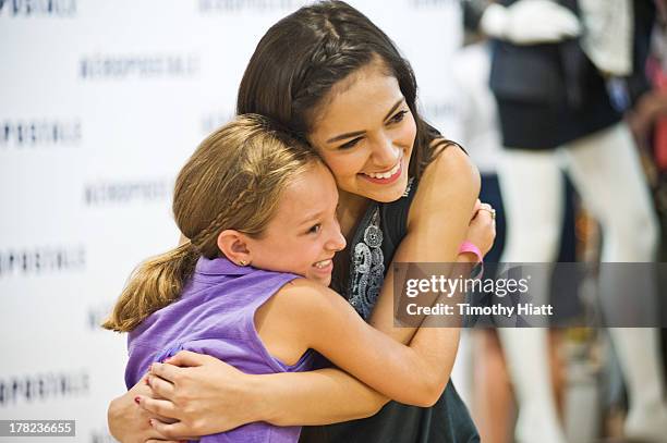 YouTube Celebrity Bethany 'Macbarbie07' Mota meets with fans at an exclusive meet & greet at the Woodfield mall Aeropostale on August 27, 2013 in...