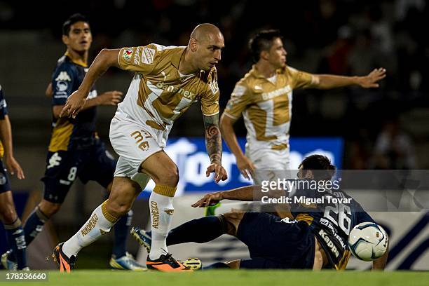 Ariel Nahuelpan of Pumas in action during a match between Pumas and Atletico San Luis as part of the Apertura 2013 Copa MX at Olympic Stadium on...