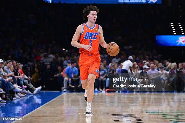 Josh Giddey of the Oklahoma City Thunder handles the ball during the first half against the Atlanta Hawks at Paycom Center on November 6, 2023 in...