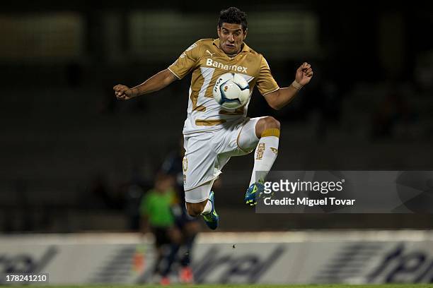 Martin Bravo of Pumas controls the ball during a match between Pumas and Atletico San Luis as part of the Apertura 2013 Copa MX at Olympic Stadium on...