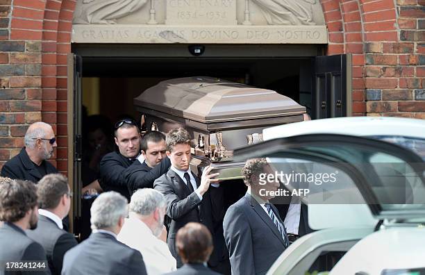 The coffin of Australian baseball player Chris Lane, who was killed in the small Oklahoma town of Duncan in the US, is carried out of St Therese's...