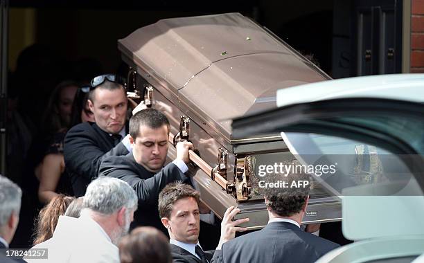 The coffin of Australian baseball player Chris Lane, who was killed in the small Oklahoma town of Duncan in the US, is carried out of St Therese's...