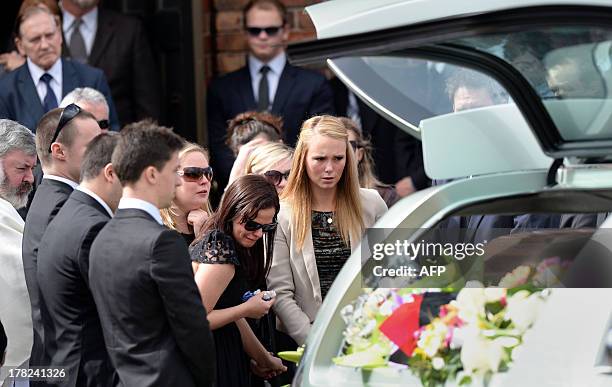 Girlfriend Sarah Harper and family members of Australian baseball player Chris Lane, who was killed in the small Oklahoma town of Duncan in the US,...