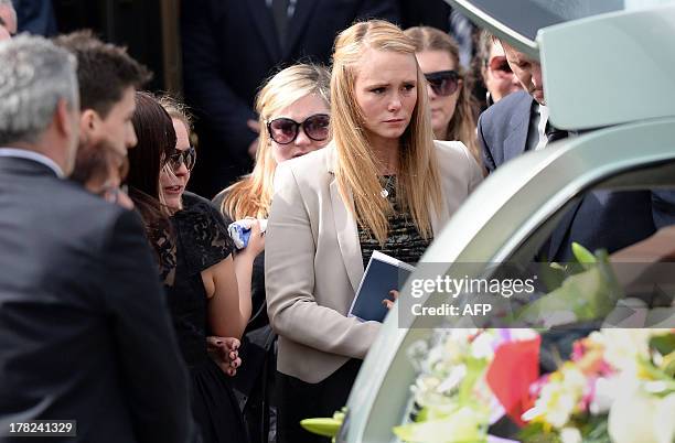 Girlfriend Sarah Harper joins family members of Australian baseball player Chris Lane, who was killed in the small Oklahoma town of Duncan in the US,...