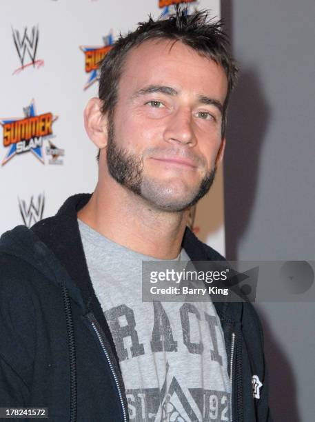 Superstar CM Punk attends the WWE SummerSlam Press Conference on August 13, 2013 at the Beverly Hills Hotel in Beverly Hills, California.