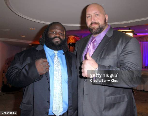 Superstars Mark Henry and Big Show attend the WWE SummerSlam Press Conference on August 13, 2013 at the Beverly Hills Hotel in Beverly Hills,...