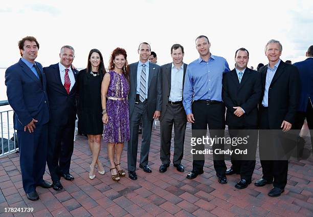 Dr. Allen Hershkowitz , Christina Weiss Lurie and Scott Jenkins attends the Green Sports Alliance Gala Dinner at The Liberty Warehouse on August 27,...