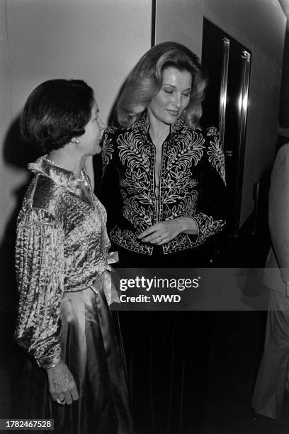 Maggie Wetzel and Nancy Mehta attend a party at Times Mirror Square in Los Angeles, California, on December 2, 1980.