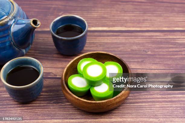 malaysian traditional dessert kuih nona manis - traditional malay food stock pictures, royalty-free photos & images