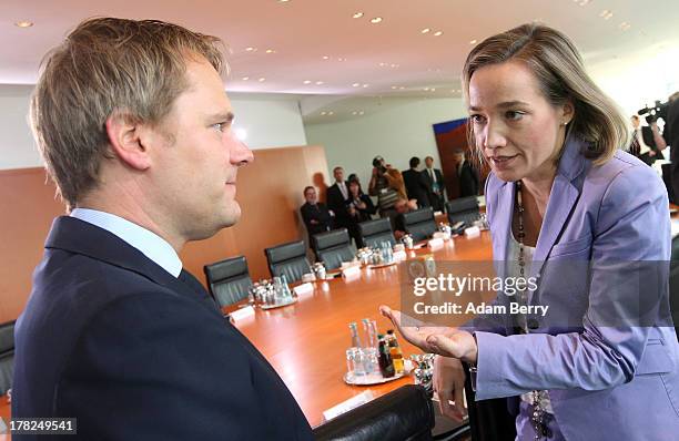 German Health Minister Daniel Bahr and German Family Minister Kristina Schroeder arrive for the weekly German federal Cabinet meeting on August 28,...