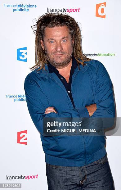 French TV host Olivier Delacroix poses during a photocall following the France Televisions new season press conference at the Palais de Tokyo on...