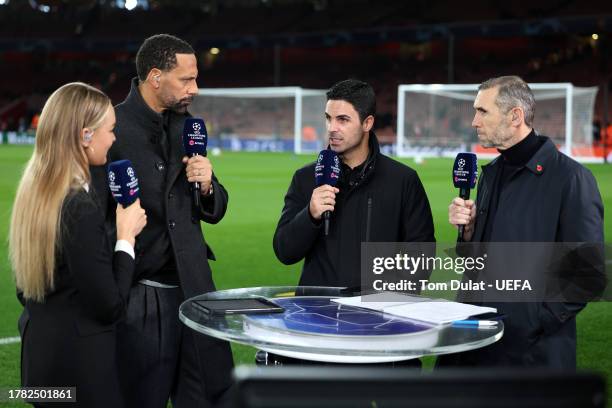 Mikel Arteta, Manager of Arsenal, speaks with TNT Sports pundits Rio Ferdinand and Martin Keown and presenter, Laura Woods prior to the UEFA...