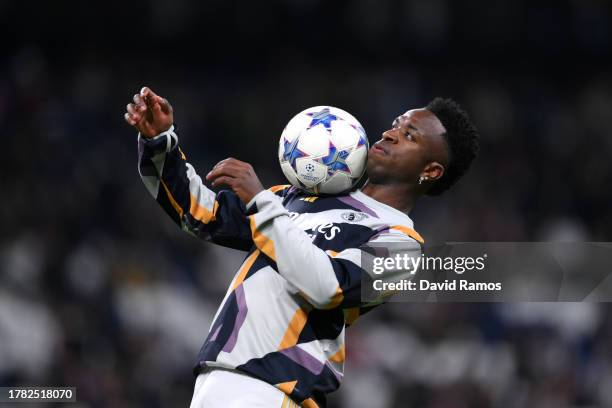 Vinicius Junior of Real Madrid warms up prior to the UEFA Champions League match between Real Madrid and SC Braga at Estadio Santiago Bernabeu on...
