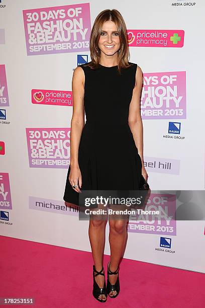 Kate Waterhouse arrives at the 30 Days of Fashion and Beauty launch party at Town Hall on August 28, 2013 in Sydney, Australia.