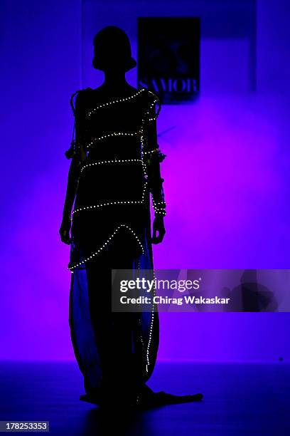 Model showcases designs by Pragya & Megha Samor during day 5 of Lakme Fashion Week Winter/Festive 2013 at the Hotel Grand Hyatt on August 27, 2013 in...