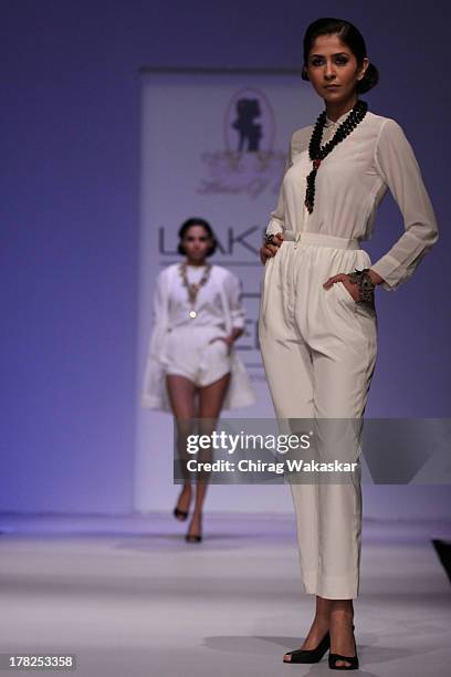 Model showcases designs by House Of Chic by Jinali Sutariya and Heena Surani during day 5 of Lakme Fashion Week Winter/Festive 2013 at the Hotel...